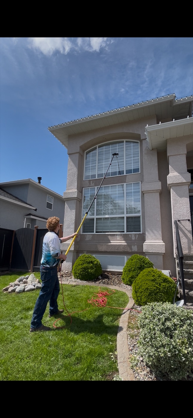 Powerhouse Pressure Washing crew washing a townhouse exterior in Walnut Grove, Langley